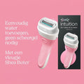 Roze scheerapparaat met witte bovenkant en schuim, met verpakking. "Eenvoudig water toevoegen, geen scheergel nodig. Met een vleugje Shea Boter".